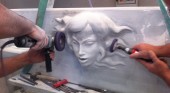 Vasca con scultura